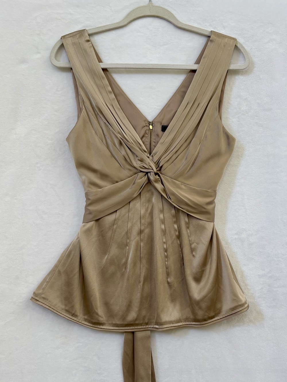 BCBGMAXAZRIA Sleeveless pleated satin peplum top / bodice in metallic taupe